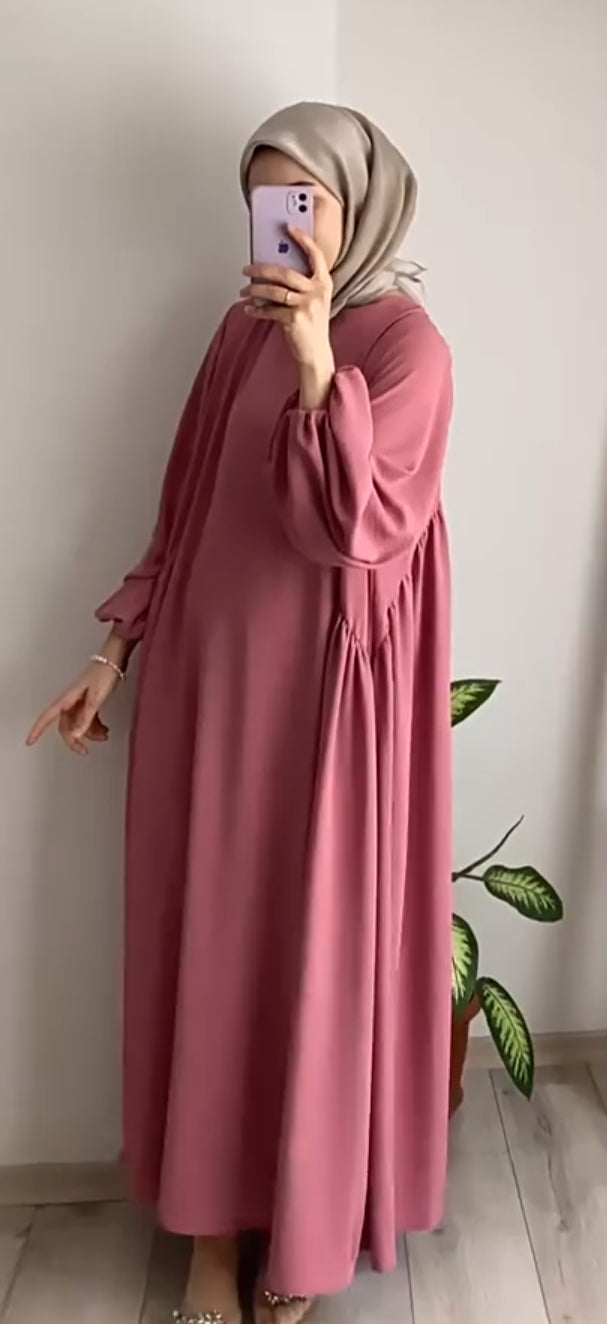 Shop the Modest Summer Abaya in Dusty Rose at Hikmah Boutique. Made from breathable crepe fabric, perfect for hot weather. Available online in all sizes. Buy now!