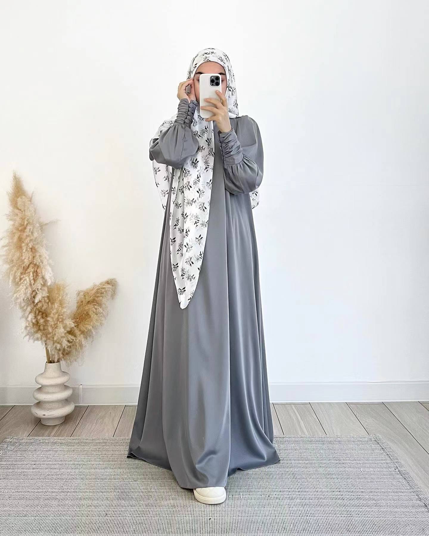 Shop the Occasion Elegance Satin Abaya in Pearl Grey at Hikmah Boutique Australia. This luxurious and elegant abaya is perfect for special occasions. Buy online today!