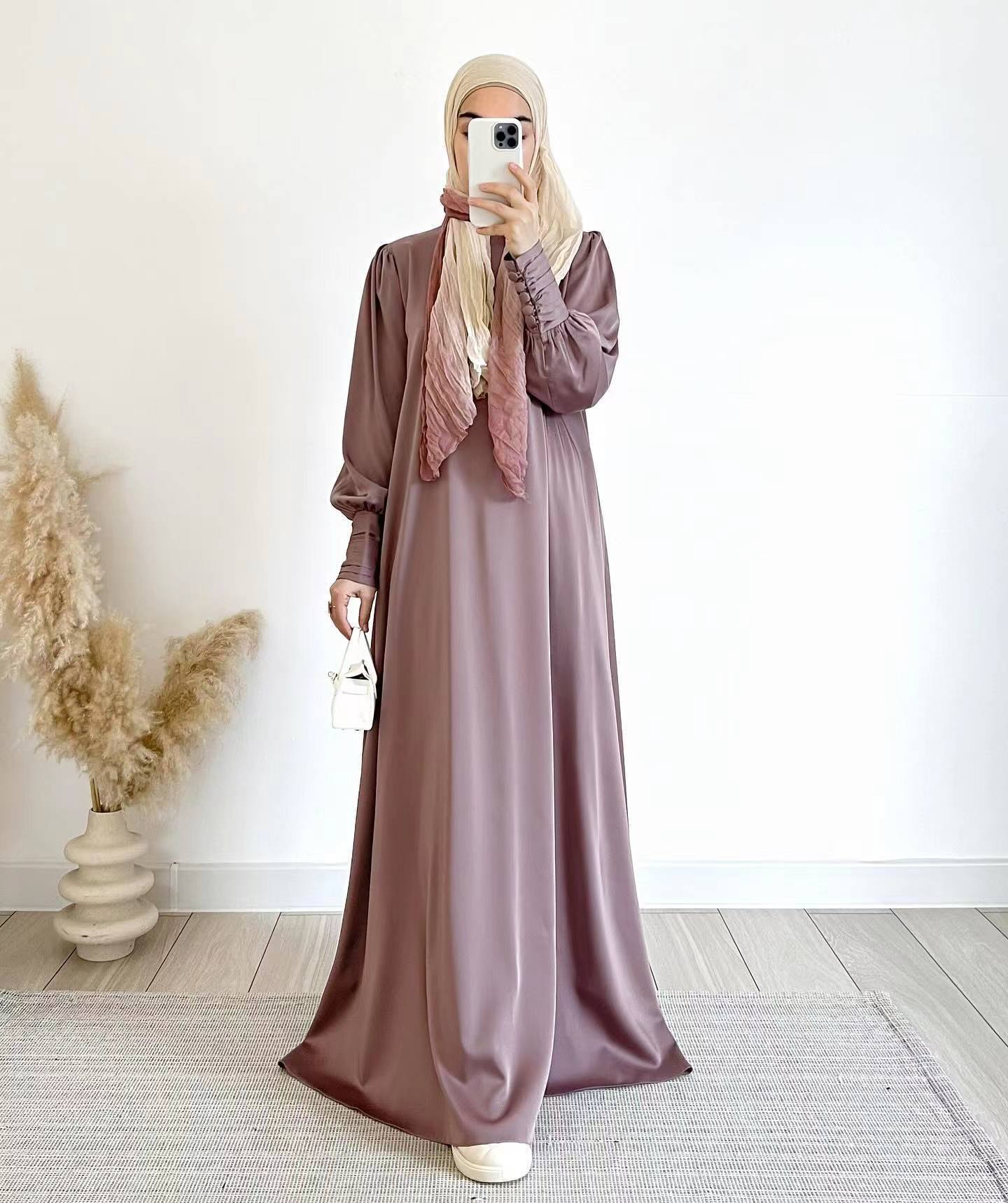 Shop the Occasion Elegance Satin Abaya in Rosita at Hikmah Boutique. This feminine and luxurious abaya is perfect for special occasions. Buy online Australia today!