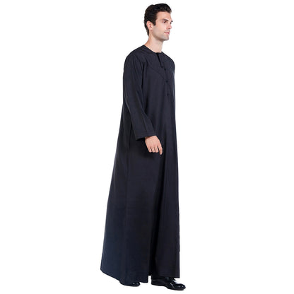 Discover timeless elegance with our Omani Men's Thobe in black, exclusive at Hikmah Boutique. Embrace sophistication and cultural heritage with this impeccably crafted thobe, blending traditional craftsmanship with a contemporary twist. Its design and attention to detail ensure comfort and style for every occasion. 