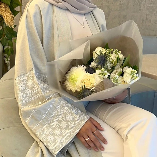 Discover the Open Abaya with Embroidered Sleeves in Beige at Hikmah Boutique Australia. Perfect for any occasion, this elegant abaya is available online. Shop now!