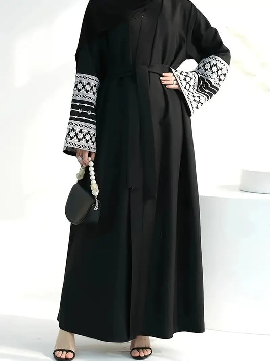 Shop the Open Abaya with Embroidered Sleeves in Black at Hikmah Boutique Australia. This elegant and timeless abaya is perfect for any occasion. Buy online today!