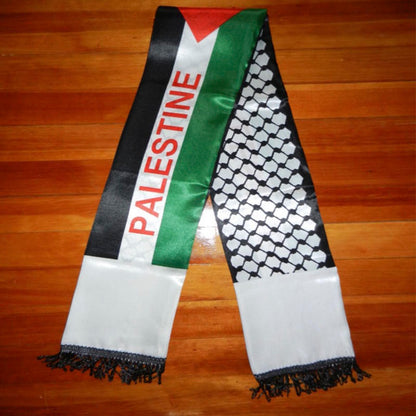 Discover the essence of solidarity with our Palestine Flag Keffiyeh Neck Scarf. Expertly crafted by Hikmah Boutique, this authentic symbol of resilience and heritage is more than just a scarf—it's a statement. Embrace tradition and show your support today.