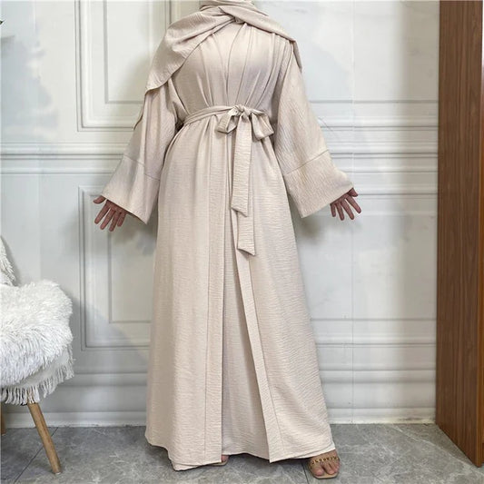 Elevate your modest wardrobe with our stunning Plain Abaya 3-piece set in classic Beige, exclusively offered by Hikmah Boutique. Crafted with meticulous attention to detail, each piece in this ensemble is made from premium crepe fabric, ensuring comfort and a graceful drape that flatters modest clothing silhouette.