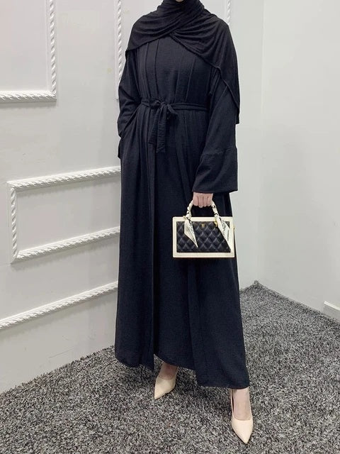 Introducing our exquisite Plain Abaya 3-piece set in classic Black, exclusively available at Hikmah Boutique. Crafted with precision from premium crepe fabric, this Plain Abaya epitomizes luxury and comfort, ensuring a graceful drape and elegant modest clothing silhouette.