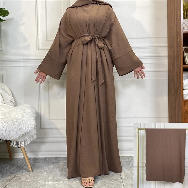 Elevate your modest wardrobe with our exquisite Plain Abaya 3-piece set in rich Chocolate Brown, exclusively offered by Hikmah Boutique. Each piece in this ensemble is meticulously crafted from premium crepe fabric, ensuring luxurious comfort and a graceful drape that flatters modest clothing silhouette. 