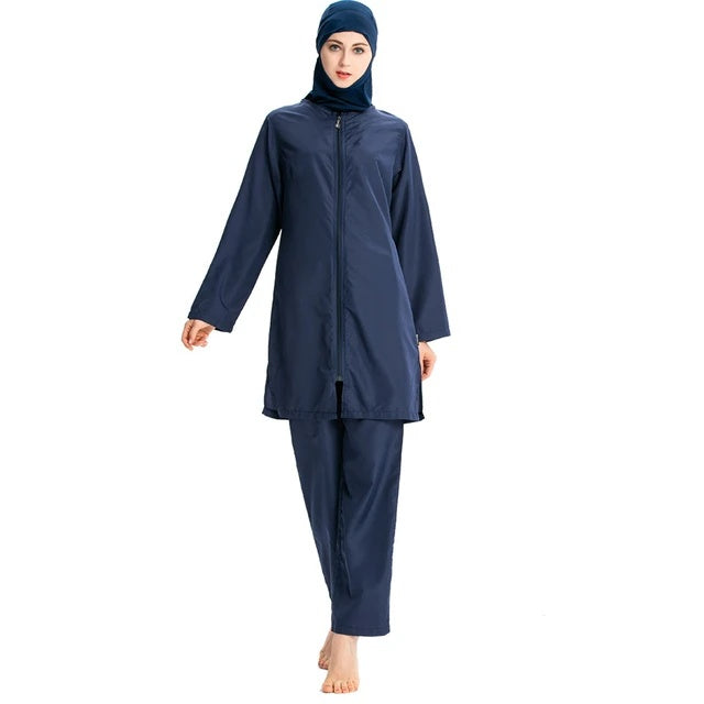 Discover the Women’s Plain Navy Burkini Modest Swimwear Set at Hikmah Boutique. A stylish, modest 3-piece set, available in all sizes. Shop online for premium Islamic swimwear.