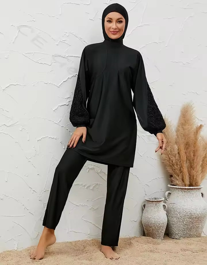 Discover the Women’s Plain Black Burkini Modest Swimwear 3 Piece Set at Hikmah Boutique. A stylish, modest 3-piece set, available in all sizes. Shop online for premium Islamic swimwear.