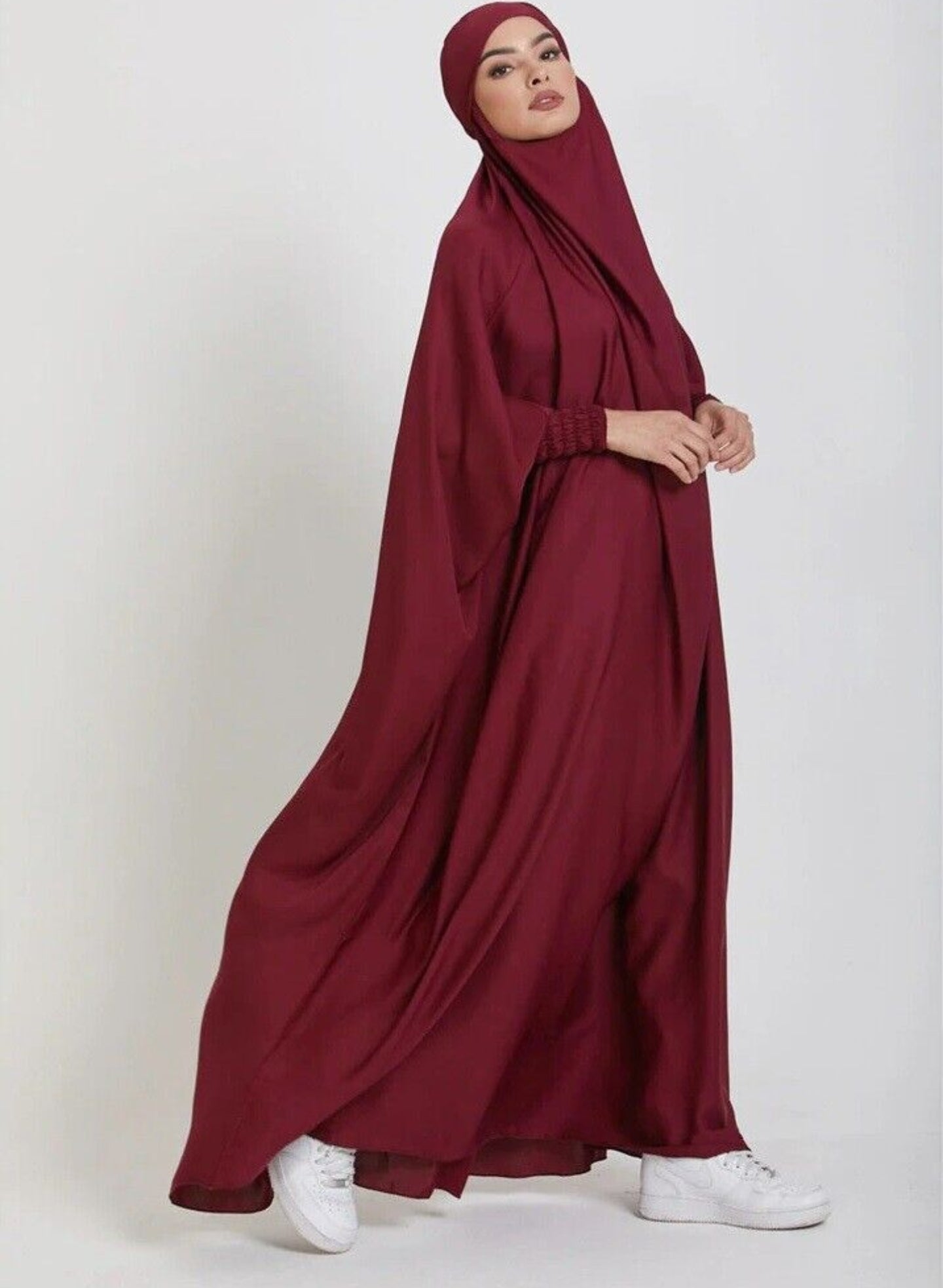 Step into regal elegance with our Maroon One Piece Tie-Up Jilbab. Meticulously designed for confident and beautiful prayer moments, this exclusive Islamic garment combines enduring modesty with opulent style. Explore the regal side of prayer wear at Hikmah Boutique.