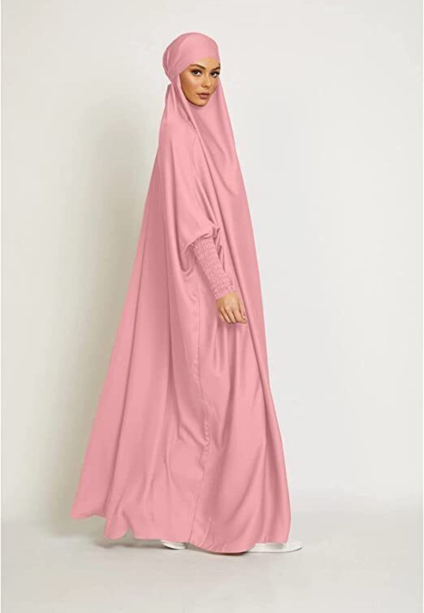 Embark on a voyage of serene beauty with our Pink Daisy One Piece Tie-Up Jilbab. Meticulously designed to harmonize modesty with contemporary allure, this exclusive Islamic garment offers a captivating symphony of grace and comfort for your sacred moments of devotion.