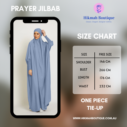 Discover elegance with our Sky Blue Jilbab from Hikmah Boutique. Explore this elegant of one-piece, tie-up satin Jilbab, blending traditional modesty with contemporary style. Shop premium, affordable, and unique Islamic fashion for women. Elevate your wardrobe with chic and comfortable prayer wear today.