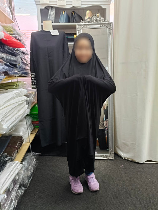 Discover our Pure Bamboo Non-Sleeved Jilbab for girls in Black at Hikmah Boutique. Made from soft, breathable bamboo fabric, this eco-friendly jilbab provides comfort and style for everyday wear.