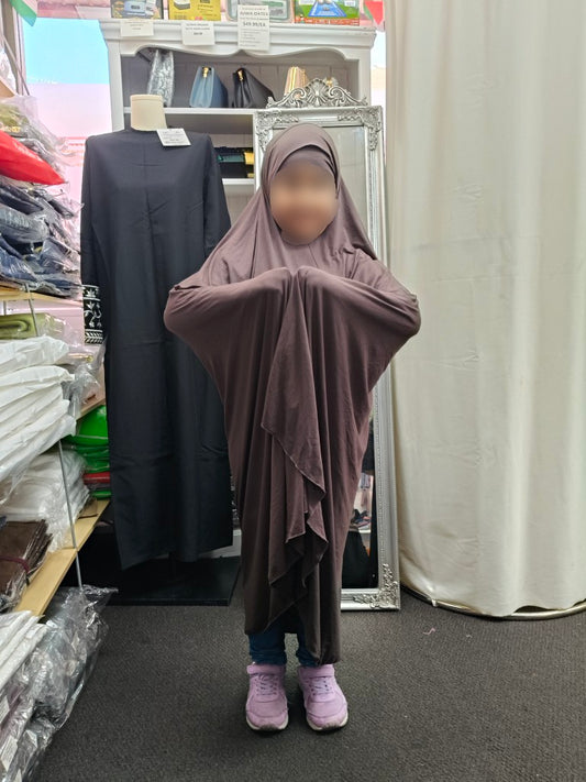 Shop the Bamboo Non-Sleeved Jilbab for girls in Dark Mocha at Hikmah Boutique Australia. Made from breathable pure bamboo, it’s lightweight, antibacterial, and perfect for all-day comfort.