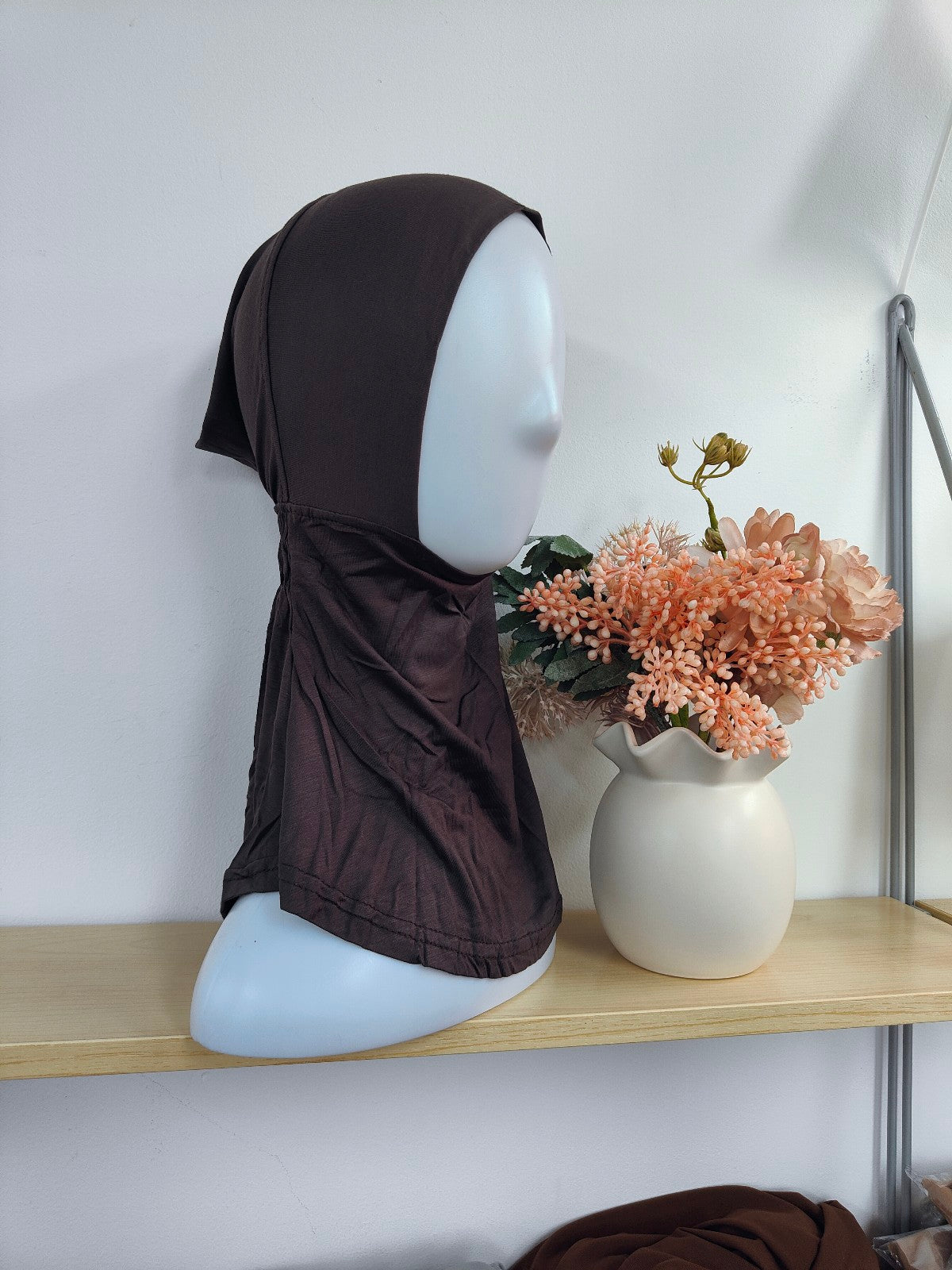 Discover the stylish Pure Bamboo Hijab Ninja Cap in Dark Mocha at Hikmah Boutique. Enjoy eco-friendly, quick-dry comfort. Perfect for all-day wear. Shop now!