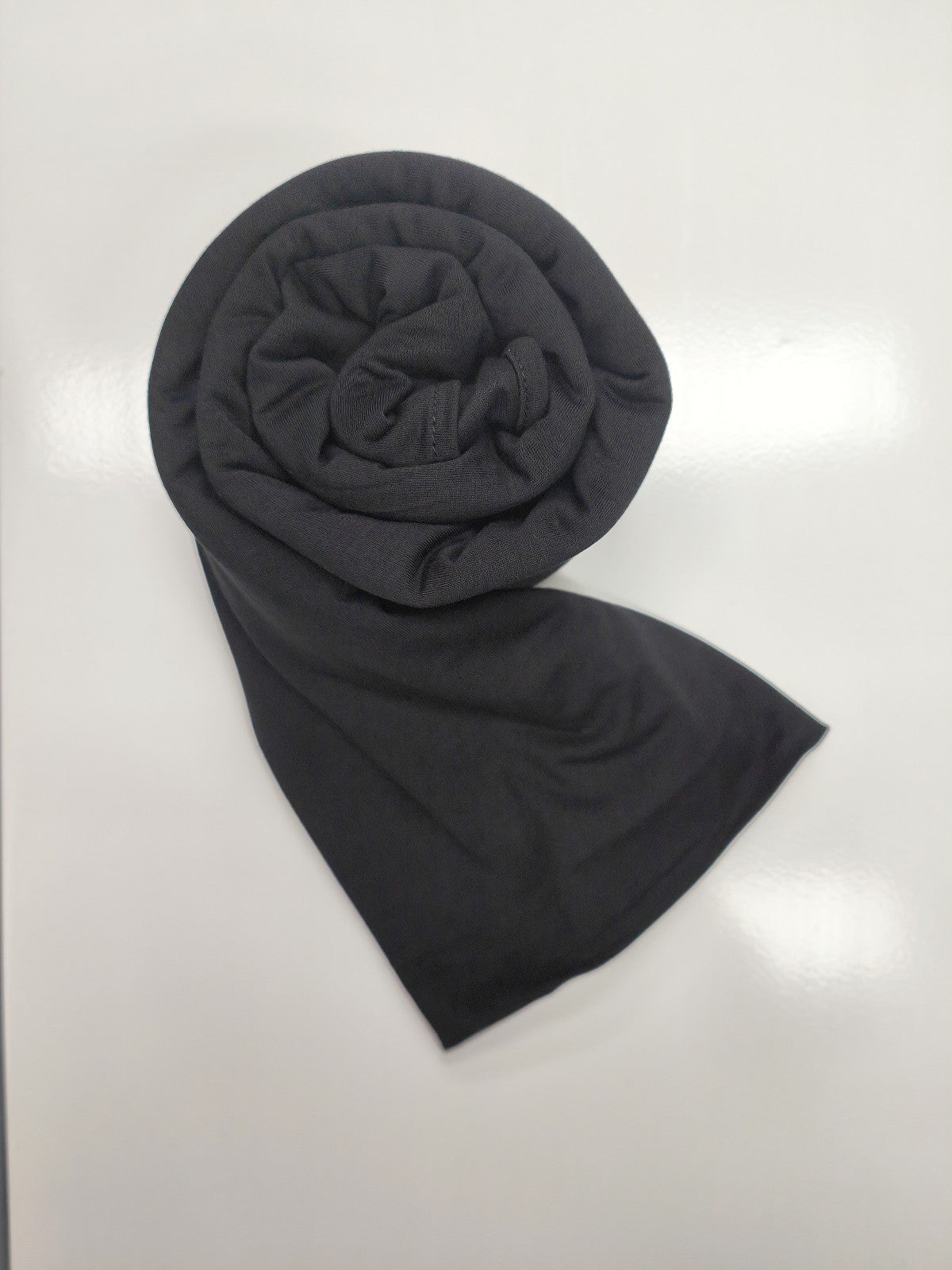 Discover elegance and comfort with our Black Pure Bamboo Hijab, exclusively offered by Hikmah Boutique. This hijab has style, breathability, and eco-friendliness, making it perfect for any occasion. Stay cool and confident with its natural antibacterial and anti-odor properties with Hikmah Boutique's Premium Quality Hijabs.