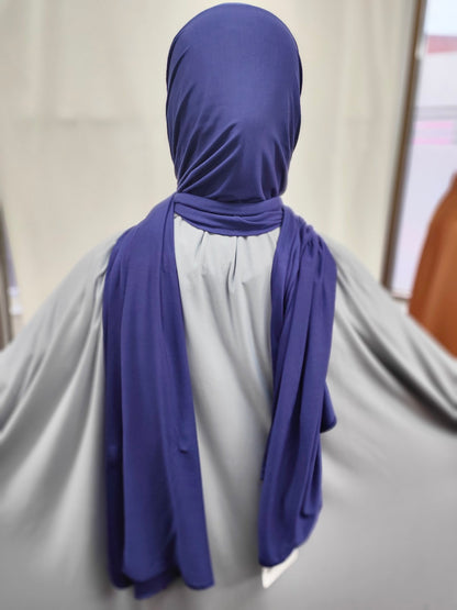 Discover the pinnacle of elegance and comfort with our Royal Blue Pure Bamboo Hijab, exclusively offered by Hikmah Boutique. This hijab seamlessly merges style, breathability, and eco-friendliness, making it the ideal choice for any occasion. Stay cool and confident with Hikmah Boutique's Premium Quality Hijabs.