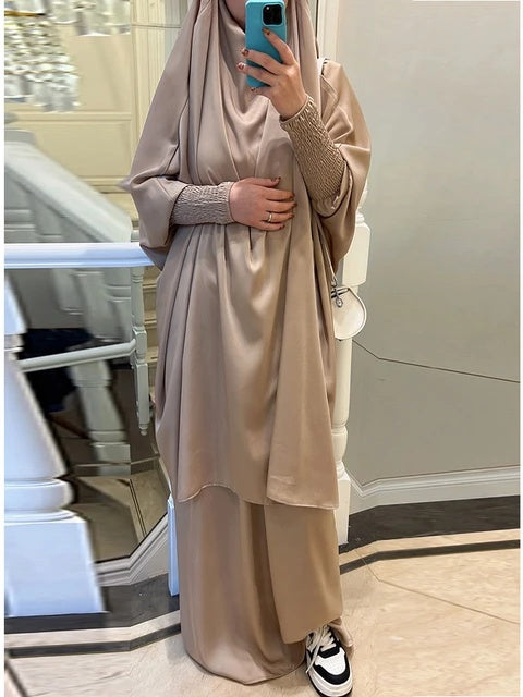 Elevate your modest wardrobe with our stunning Satin French Jilbab in Dark Beige exclusively sold at Hikmah Boutique. Crafted from premium satin material, this two-piece set offers timeless elegance and comfort. Shop now for fast delivery across Australia!