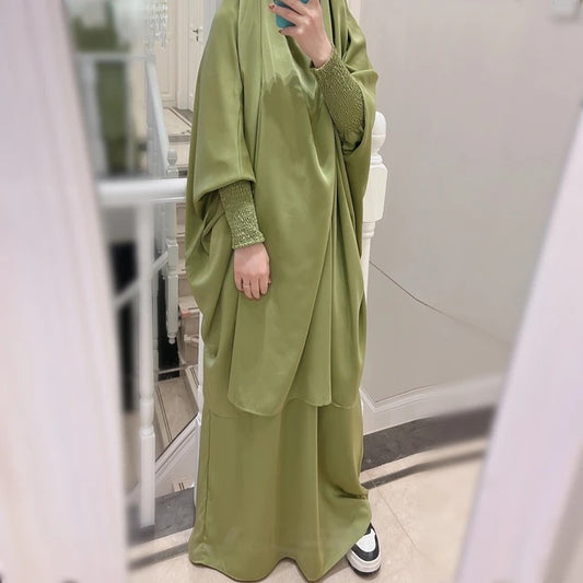 Discover elegance and modesty with our Satin French Jilbab in Lime Green. Shop online at Hikmah Boutique for this two-piece set made of premium satin material, perfect for prayer and everyday wear. Free size and fast delivery available in Australia.
