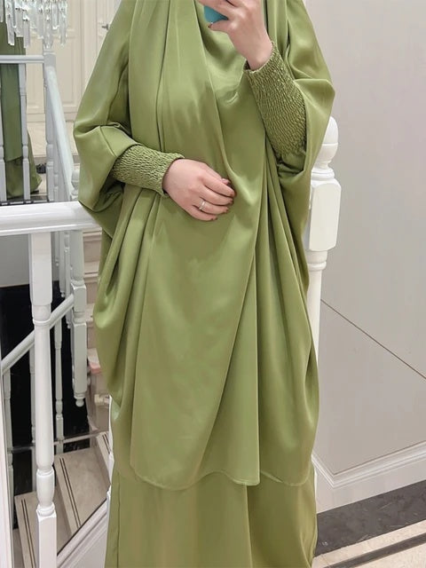 Discover elegance and modesty with our Satin French Jilbab in Lime Green. Shop online at Hikmah Boutique for this two-piece set made of premium satin material, perfect for prayer and everyday wear. Free size and fast delivery available in Australia.