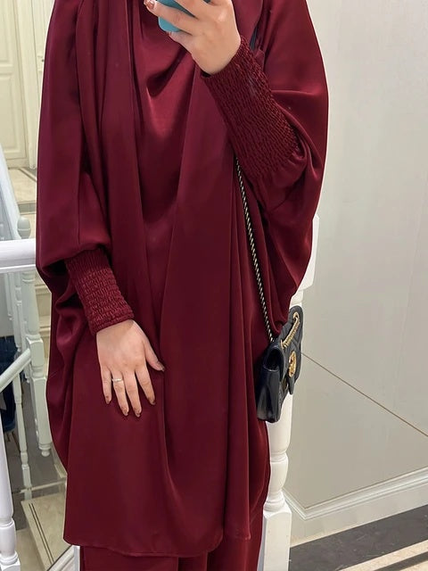 Discover the elegance of our Satin French Jilbab in Maroon exclusively at Hikmah Boutique Australia. Made with premium satin material, this two-piece set offers comfort and style for prayer and everyday wear. Buy online now!