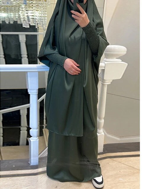 Elevate your modest wardrobe with our exquisite Satin French Jilbab in Olive Green. Shop online for this two-piece set exclusively at Hikmah Boutique. Crafted with premium satin material, perfect for daily prayers and special occasions.