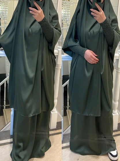Elevate your modest wardrobe with our exquisite Satin French Jilbab in Olive Green. Shop online for this two-piece set exclusively at Hikmah Boutique. Crafted with premium satin material, perfect for daily prayers and special occasions.
