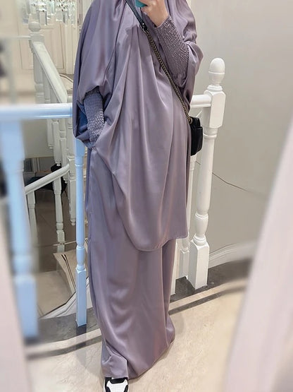 Elevate your modest clothing with our premium Silver Grey Satin French Jilbab exclusively available at Hikmah Boutique. Crafted with exquisite detail, this two-piece set offers timeless elegance and comfort. Shop online in Australia for French Jilbabs and more.