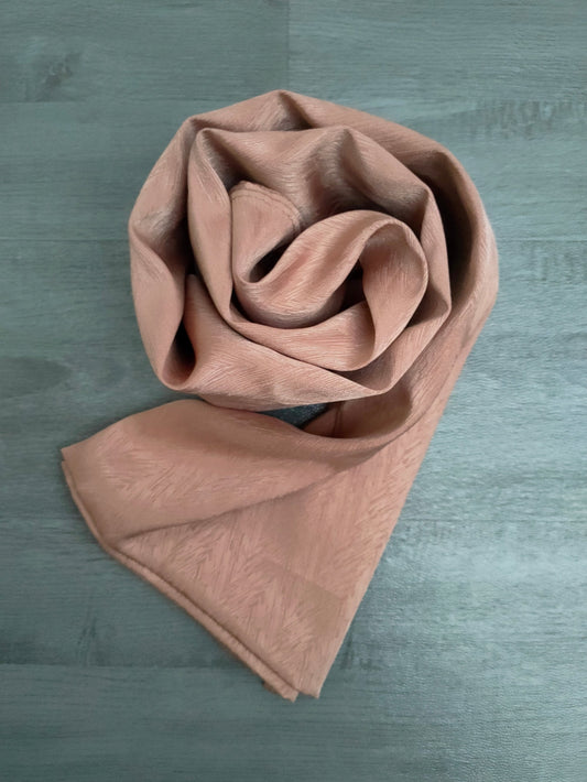 Indulge in the allure of our Elegant Golden Sand Satin Hijab, a true embodiment of elegance and style. This premium-quality hijab is meticulously crafted with the finest satin fabric, ensuring a lustrous sheen and a soft, luxurious feel. Shop now to experience the luxury of our Golden Sand Satin Hijab!