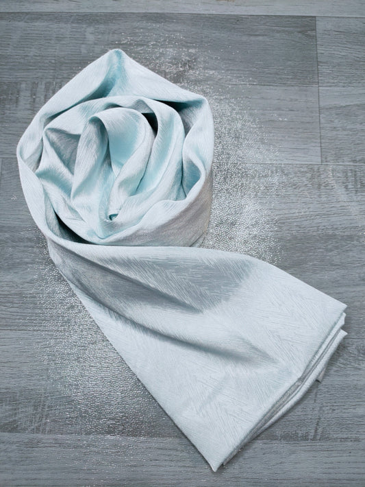 Discover timeless elegance with our Vista Blue Satin Hijab. Crafted from premium satin, this hijab exudes sophistication and style. The lustrous fabric drapes beautifully, perfect for formal events or daily wear. Elevate your look with Hikmah Boutique's exclusive hijab collection.