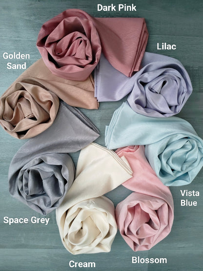 Indulge in the allure of our Elegant Golden Sand Satin Hijab, a true embodiment of elegance and style. This premium-quality hijab is meticulously crafted with the finest satin fabric, ensuring a lustrous sheen and a soft, luxurious feel. Shop now to experience the luxury of our Golden Sand Satin Hijab!