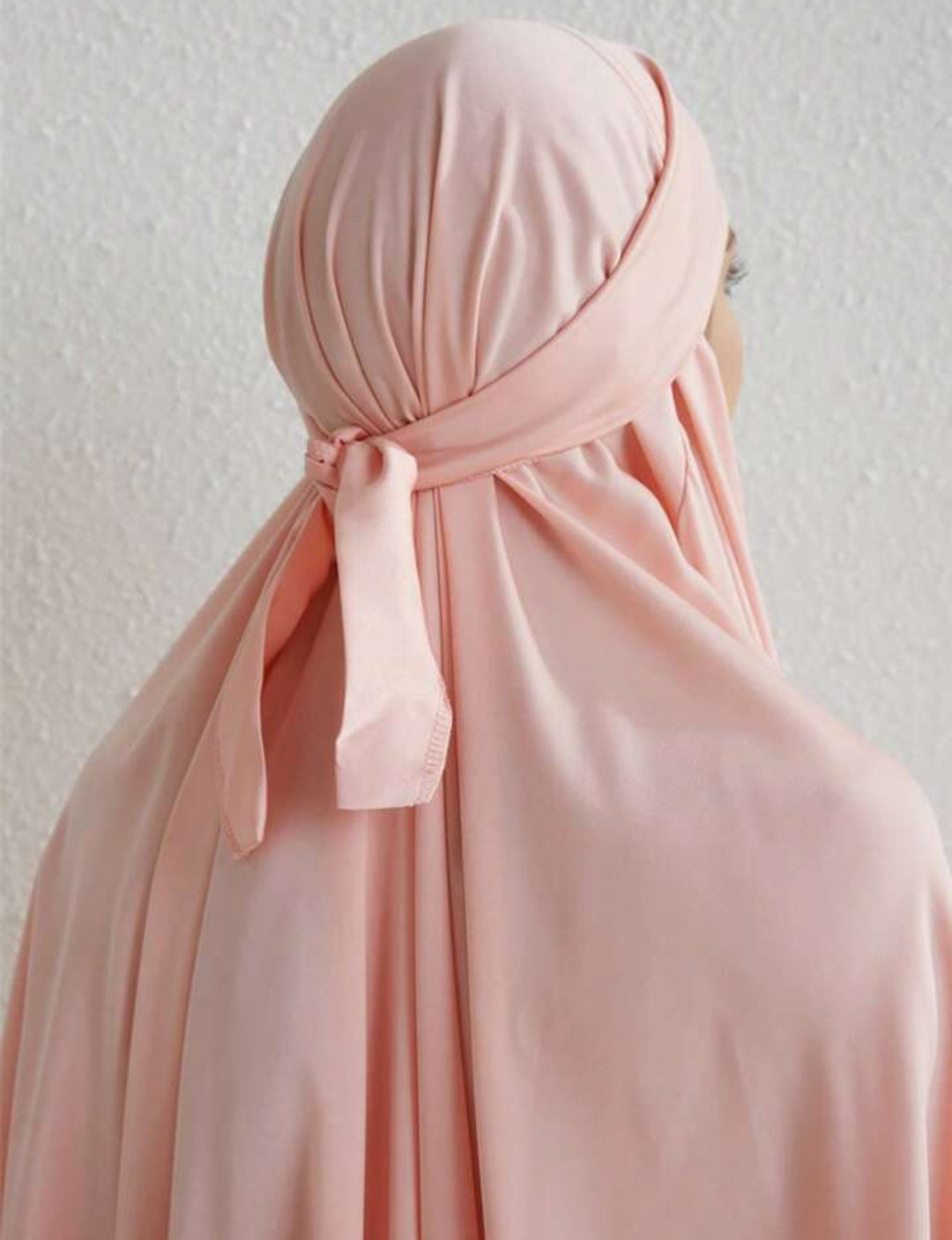 Introducing the epitome of regal elegance - the Satin Jilbab in Blossom Pink, exclusively offered by Hikmah Boutique. Envelop yourself in luxurious satin fabric, meticulously tailored to perfection, promising an unparalleled experience of grace and sophistication fit for royalty.
