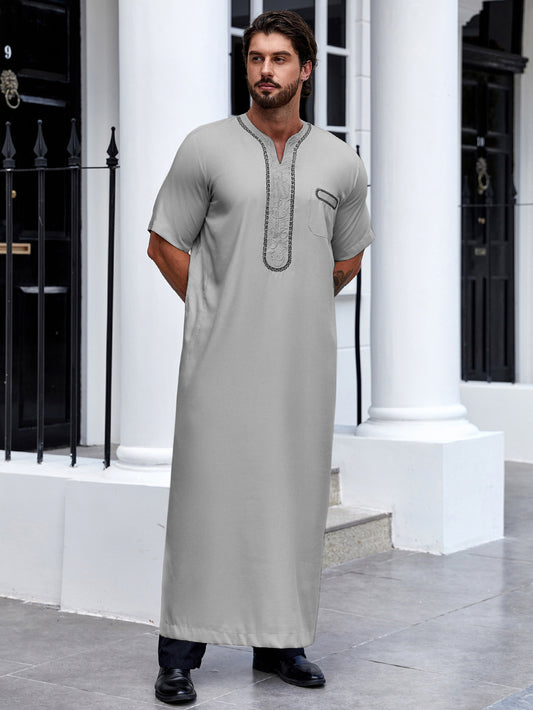 Elevate your style with our grey Saudi men's thobe. Featuring intricate embroidery and comfortable half sleeves, this modest clothing is perfect for everyday wear. Shop now!