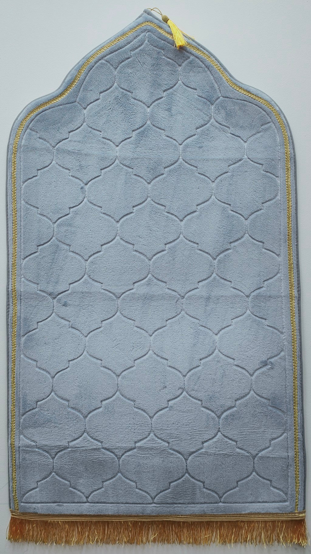 Elevate your daily prayers with the luxurious comfort of our Silver Grey Padded Prayer Mat by Hikmah Boutique. Crafted for durability and elegance, this reasonably priced Islamic prayer rug is available exclusively at Hikmah Boutique.