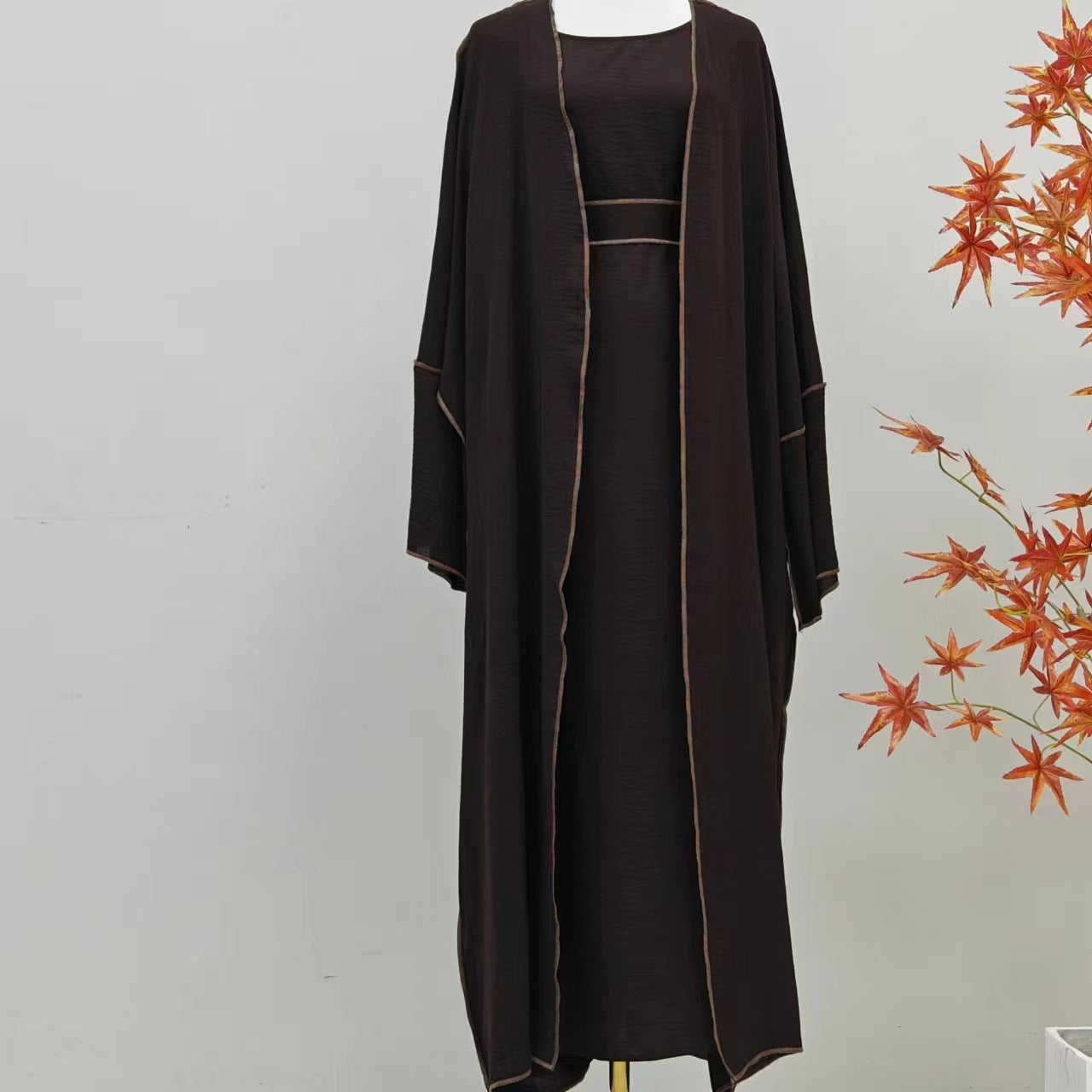 Radiate elegance with the Summer Abaya 2-Piece Set in Dark Coffee, exclusively designed to meet the needs of modest summer fashion at Hikmah Boutique Australia Online.