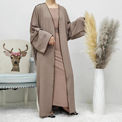 Discover understated modest elegance with Modest Summer Abaya 2-Piece Set in Dusty Coffee, a versatile addition to your summer wardrobe at Hikmah Boutique Australia Online.