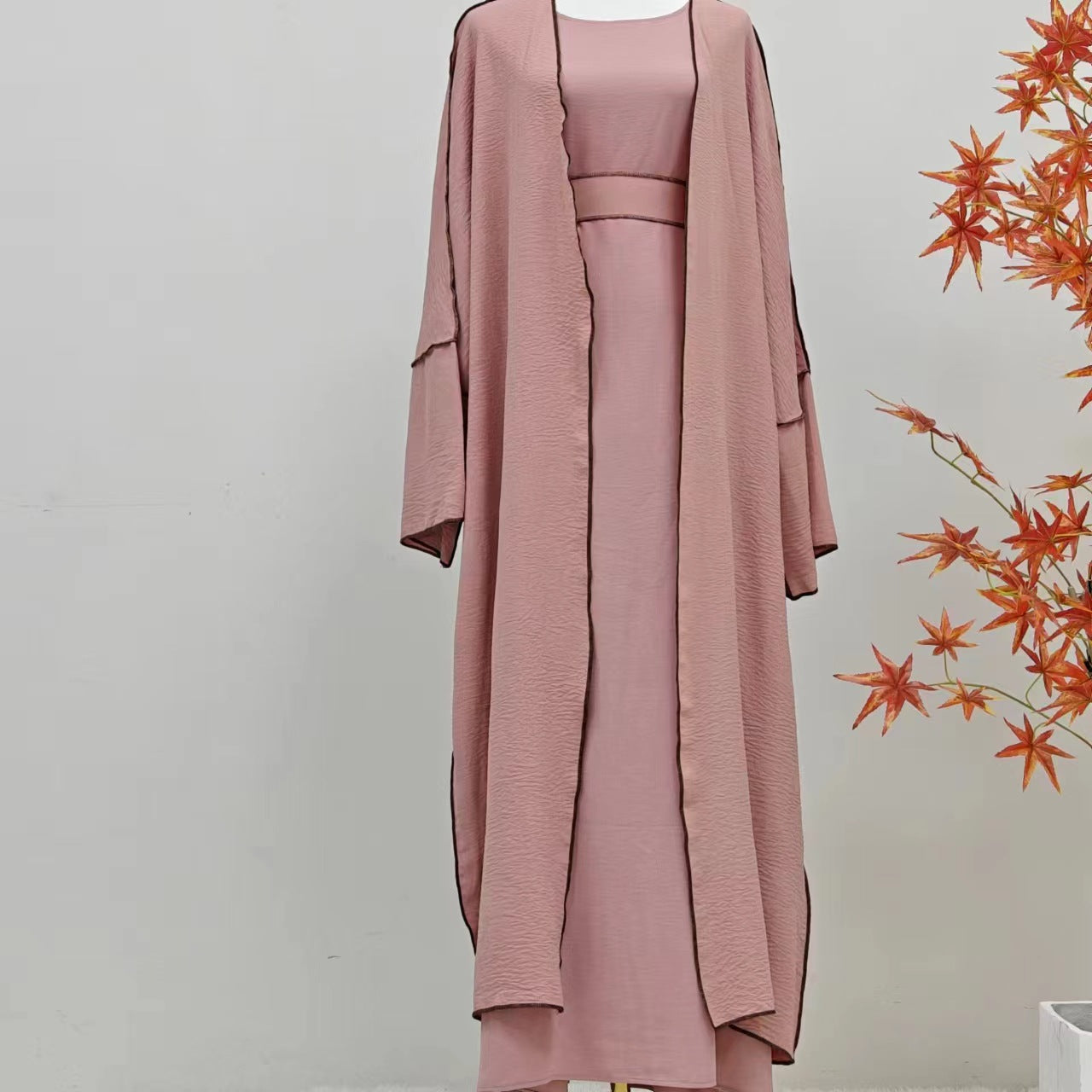 Add a touch of modest femininity to your wardrobe with the Summer Abaya 2-Piece Set in Pink, exclusively available at Hikmah Boutique, abaya store in Sydney.