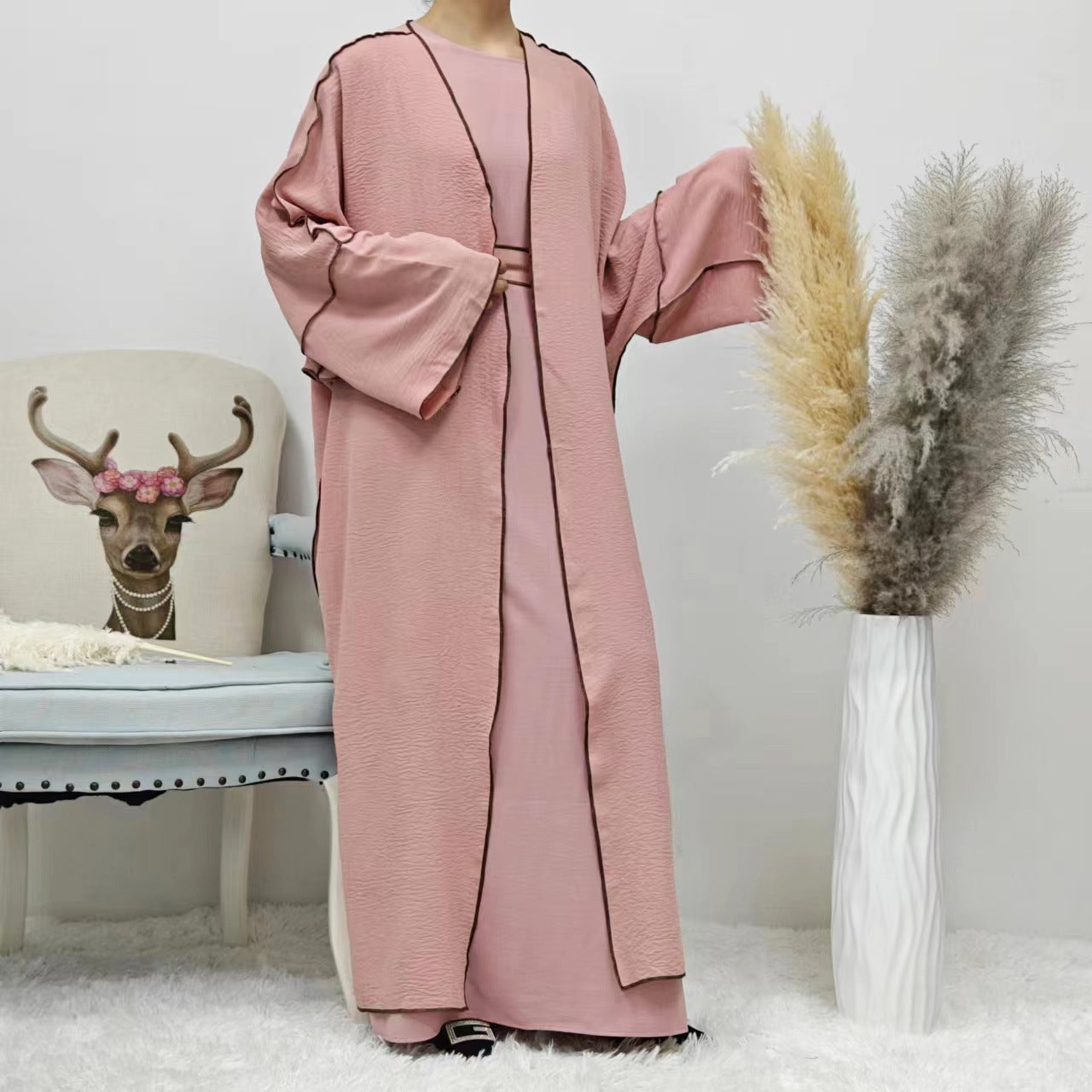 Add a touch of modest femininity to your wardrobe with the Summer Abaya 2-Piece Set in Pink, exclusively available at Hikmah Boutique, abaya store in Sydney.