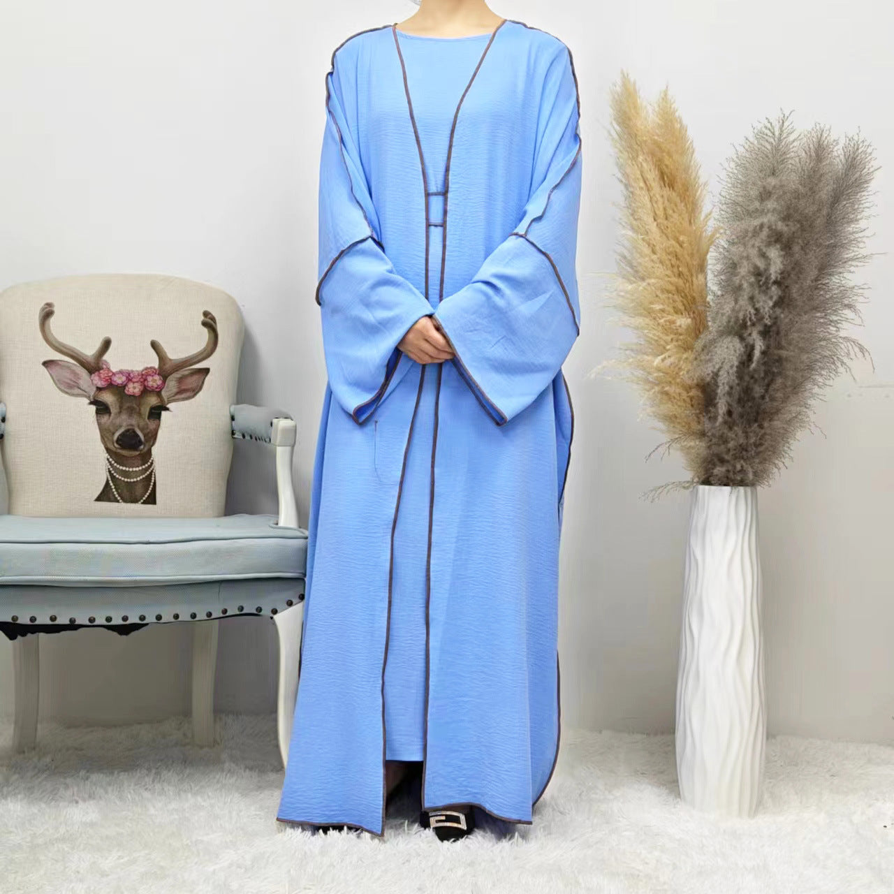 Brighten up your modest summer look with the Summer Abaya 2-Piece Set in Sky Blue. This charming set is a must-have for every modest clothing wardrobe at Hikmah Boutique.