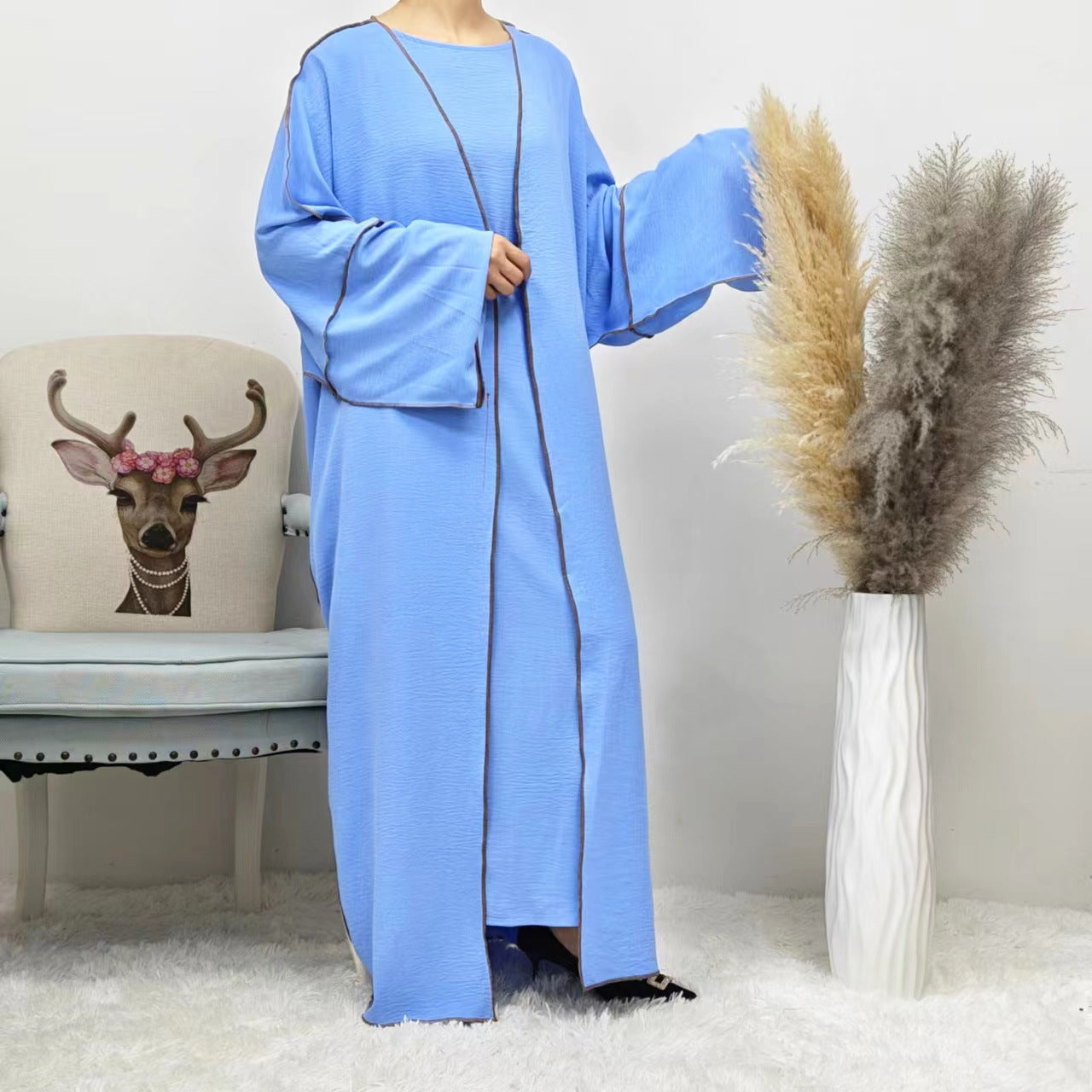 Brighten up your modest summer look with the Summer Abaya 2-Piece Set in Sky Blue. This charming set is a must-have for every modest clothing wardrobe at Hikmah Boutique.