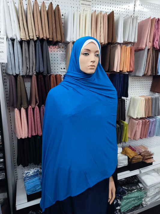Discover the ultimate in comfort and style with our Premium Jersey Hijab in Teal. Shop soft, lightweight, and stretch jersey hijabs for summer and sports at Hikmah Boutique. Your go-to online hijab shop for affordable, stylish, and premium modest clothing.