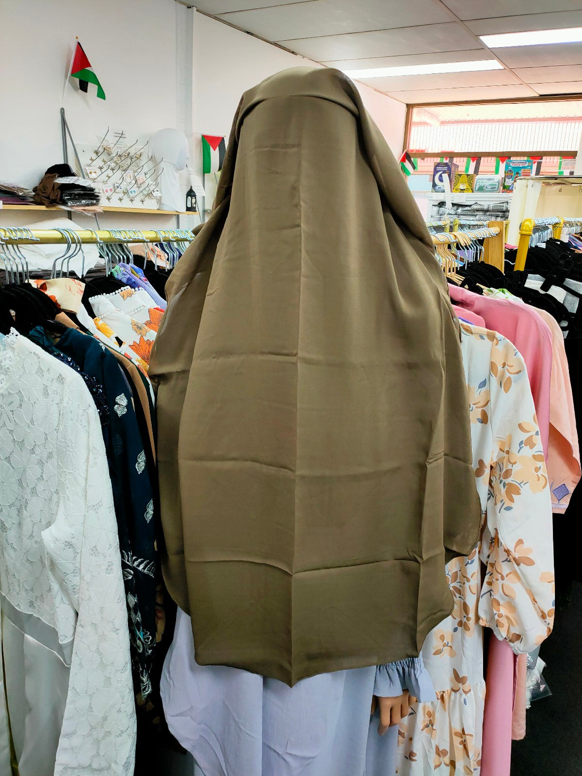 Introducing the Hikmah Boutique Triple Layer Niqab in Dusty Brown: Elevate Your Modesty with Timeless Sophistication Experience the epitome of Islamic niqabs with our exclusive Triple Layer Niqab in Dusty Brown, meticulously crafted to meet the discerning needs of modest fashion enthusiasts. 