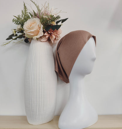 Discover our collection of stylish hijab sets, perfect for those who want to stay fashionable while maintaining modesty. This set feature trendy designs and Chocolate Brown color that complement any outfit, ensuring you look chic every day.