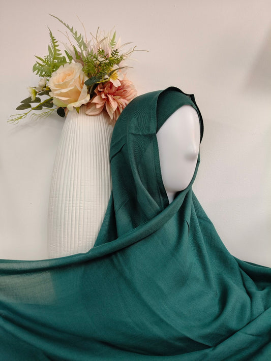 For everyday wear, our collection of everyday hijab sets provides comfort and style. These sets are designed for durability and ease of wear, making them perfect for daily use while maintaining a fashionable look.