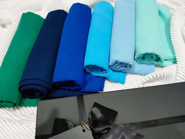 This Premium Chiffon Hijab Gift Box is the perfect way to treat yourself or someone you want to gift. Made of chiffon fabric, this hijab is beautiful, comfortable and elegant. This Elegant Range contains six sheer, elegant, and most comfortable hijabs in colors Aruba Blue, Vista Blue, Sky Blue, Royal Blue, Majolica Blue and Sea Green. This will not only amaze you but also helps you influence your poise. These hijabs will make you look sophisticated and elegant while fulfilling the religious obligation. 