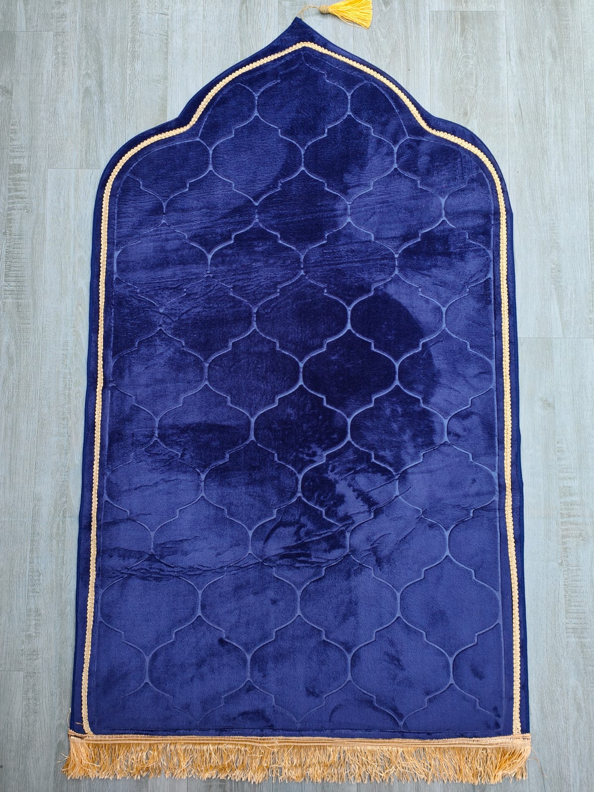 Discover the exquisite Royal Blue Padded Prayer Mat exclusively available at Hikmah Boutique. Experience unmatched comfort and quality at a reasonable price. Perfect for your daily prayers. Shop now!