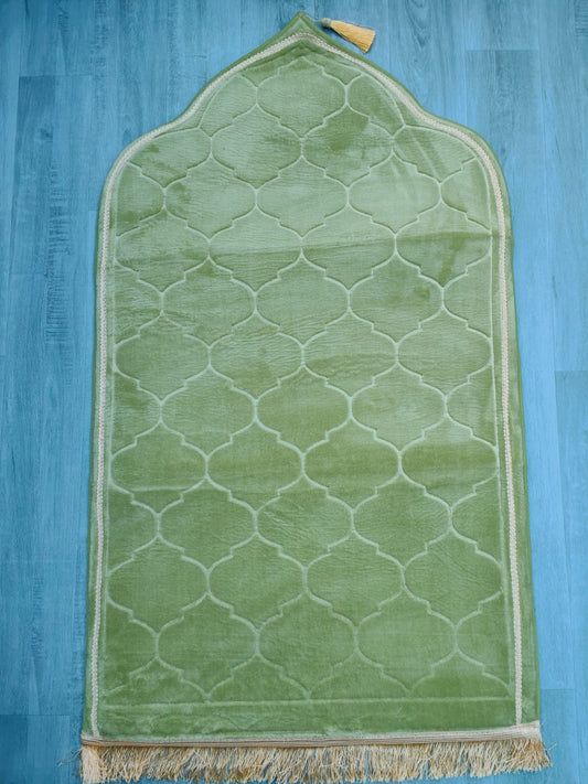 Introducing Hikmah Boutique's Lime Green prayer mat, a true masterpiece in craftsmanship and design. Measuring 110cm in length and 65cm in width, this mat provides an exceptional prayer experience with its unparalleled softness and comfort. This mat is not only beautiful but durable, ensuring long-lasting use. 