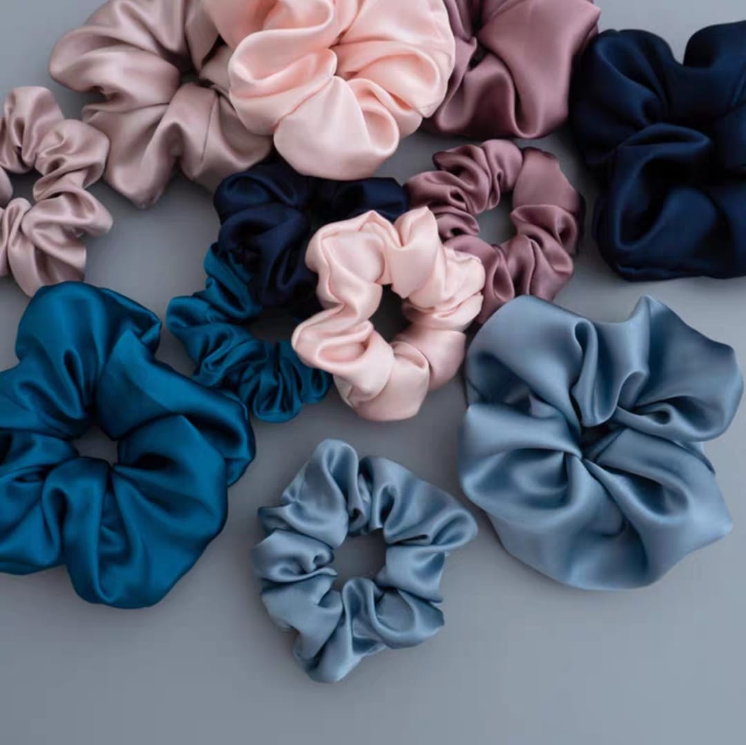 Indulge in the luxurious softness of our 100% silk scrunchies, designed to elevate your hair styling routine. Made from the finest quality 100% silk, these scrunchies offer an incredibly gentle, silky-smooth touch that helps minimize hair breakage and keep your tresses looking pristine. *Available in sizes 3.5cm & 6cm