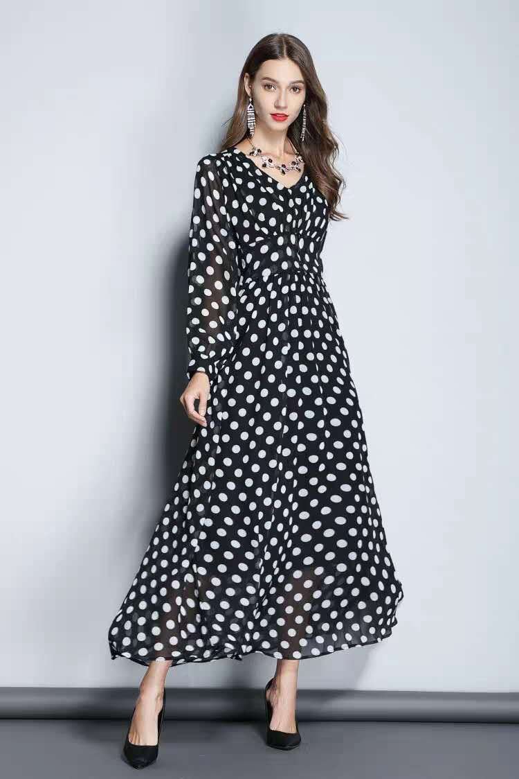 This stunning polka dot dress from Hikmah Boutique is crafted with care from high-quality, lightweight fabric. This polka dot dress features a flattering fitted waist and a classic A-line silhouette, with a beautiful flared skirt. Polka dot dress also features a V-neckline that adds a touch of elegance and class. 