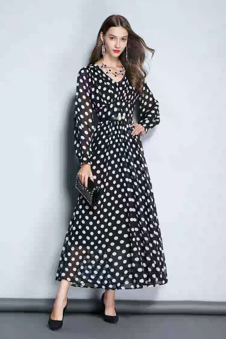 This stunning polka dot dress from Hikmah Boutique is crafted with care from high-quality, lightweight fabric. This polka dot dress features a flattering fitted waist and a classic A-line silhouette, with a beautiful flared skirt. Polka dot dress also features a V-neckline that adds a touch of elegance and class. 