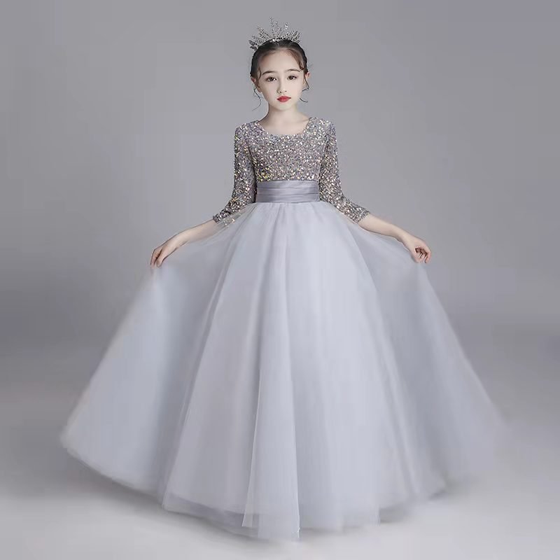 Introducing our exquisite Organza Girls Dress from Hikmah Boutique, a true embodiment of elegance and grace. This enchanting dress is designed to make your little princess feel like royalty on any special occasion. Crafted with meticulous attention to detail, this dress is perfect for weddings, parties, and formal events.